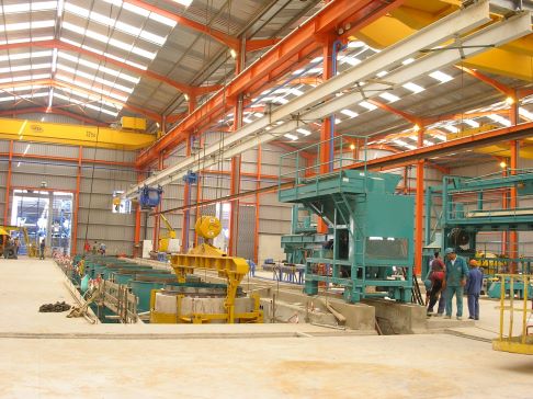 Rebar and rewire spun concrete process