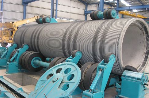 Rebar and rewire spun concrete process