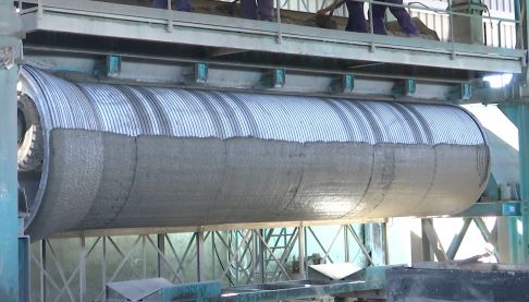 Rebar and rewire spun concrete process