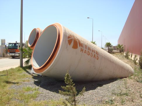 Rebar and rewire spun concrete process