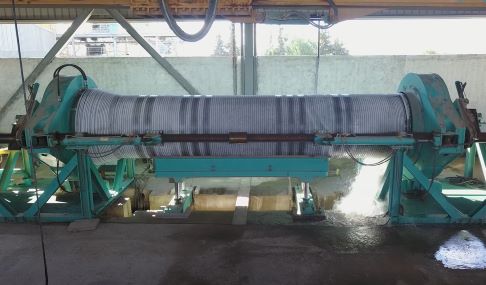 Rebar and rewire spun concrete process