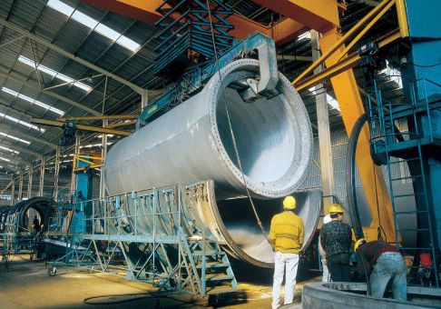 Rebar and rewire spun concrete process