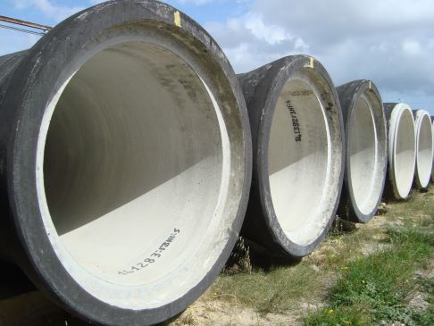 Rebar and rewire spun concrete process