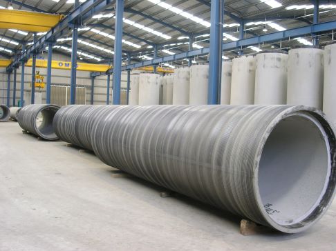 Rebar and rewire spun concrete process